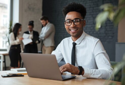 happy-young-african-businessman_171337-736