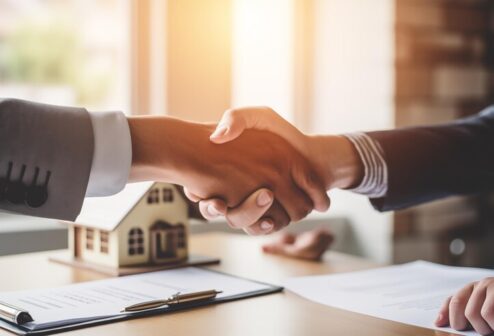 real-estate-agent-buyer-shake-hands-after-signing-papers-office_172447-3278 real-estate-agent-buyer-shake-hands-after-signing-papers-office_172447-3278